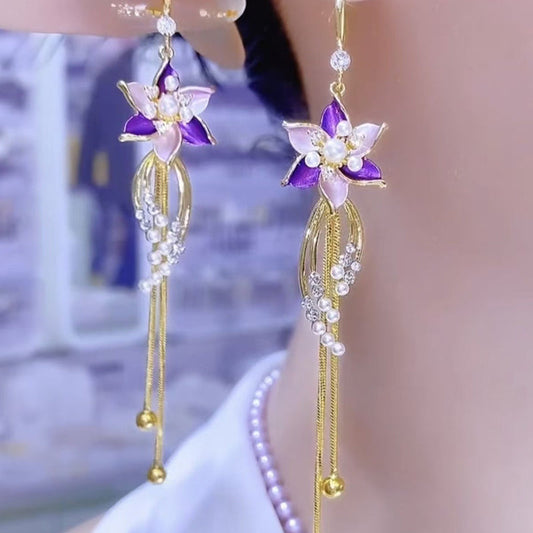 Elegante Ohrringe mit violetten Blütenquasten