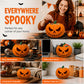 Decorazione di Halloween con zucca dagli occhi rossi